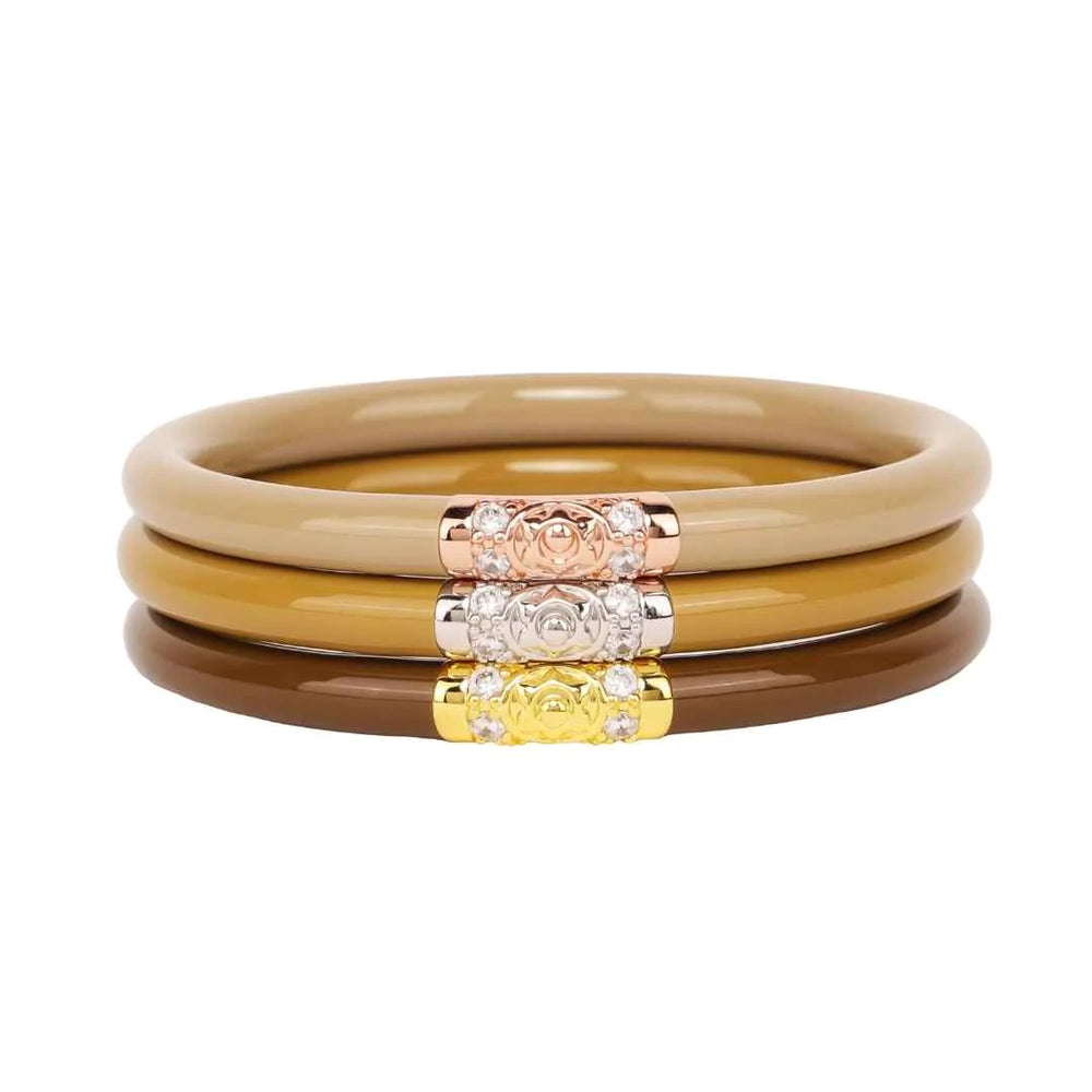 
            
                Load image into Gallery viewer, THREE KINGS ALL WEATHER BANGLES® (AWB®) - ORO
            
        